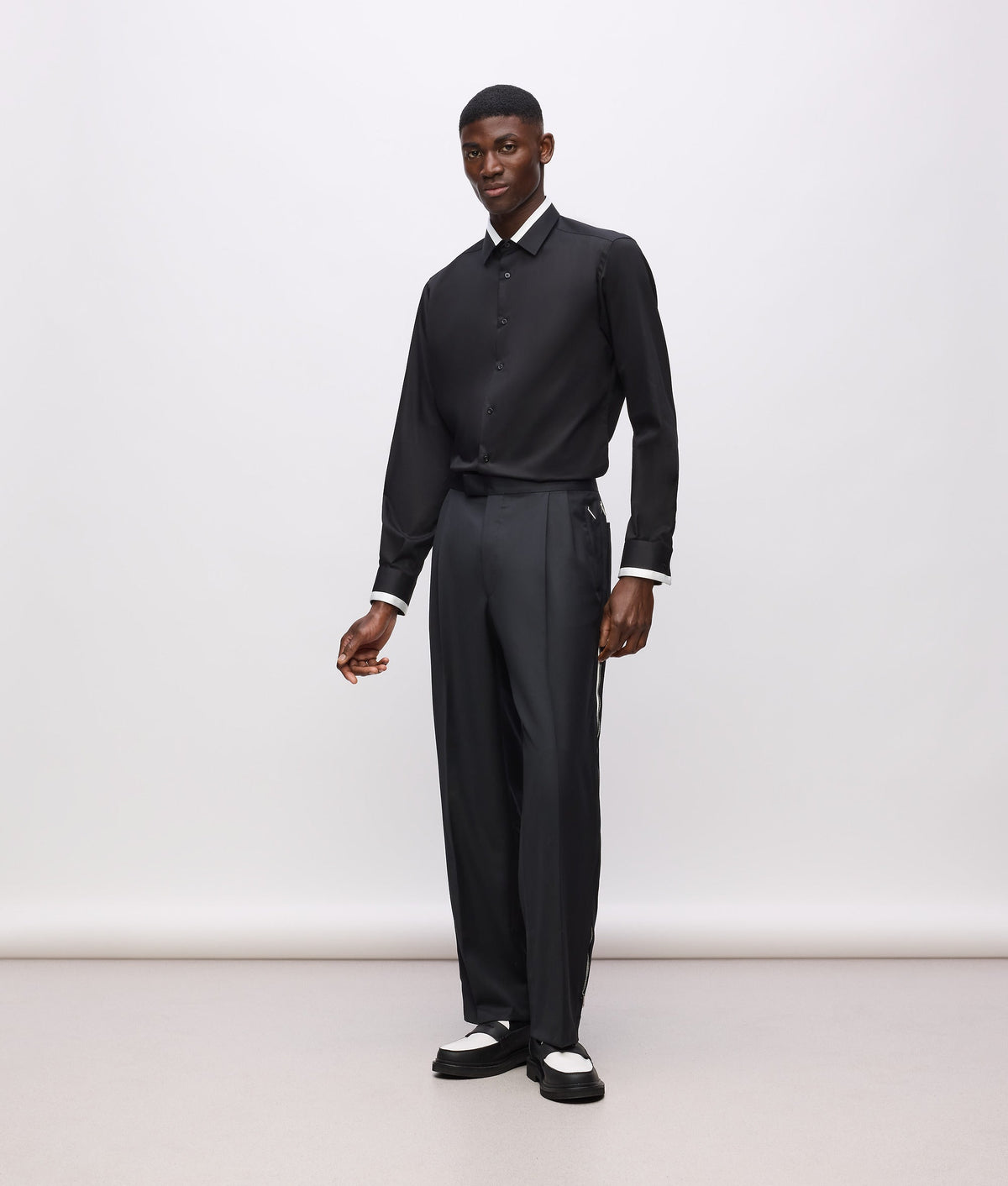 KL Studio contrast piping trousers