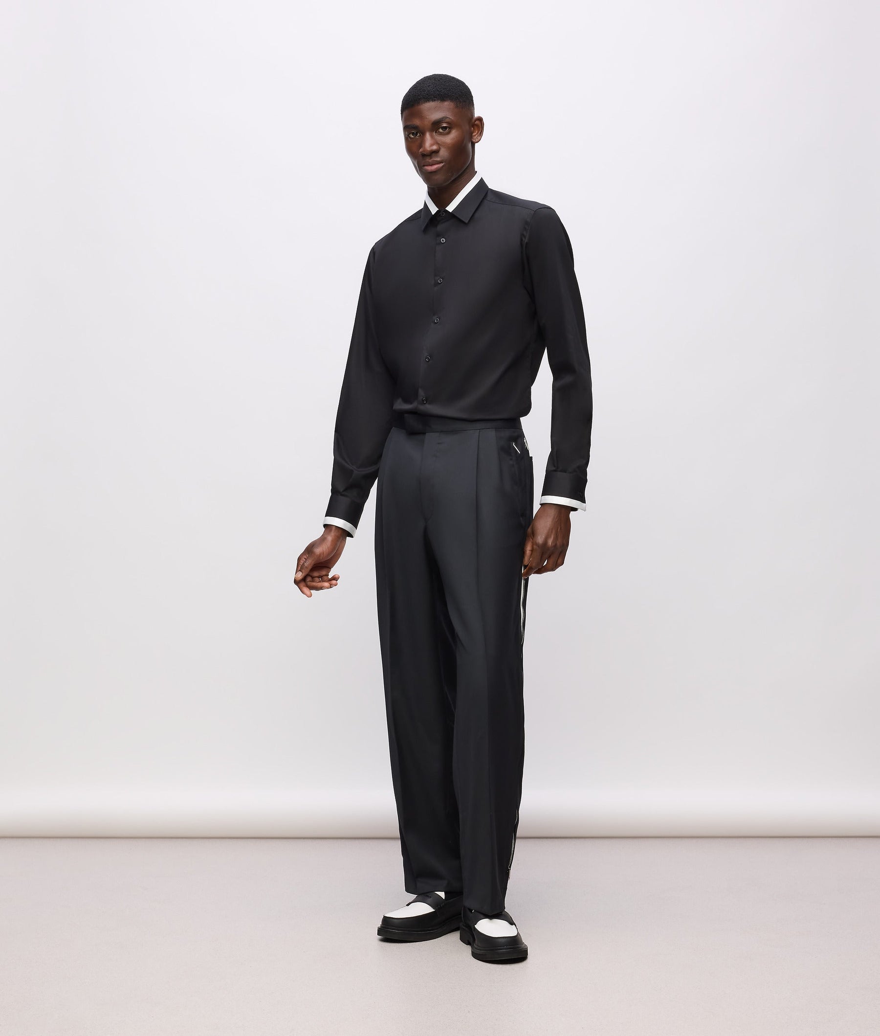 KL Studio contrast piping trousers