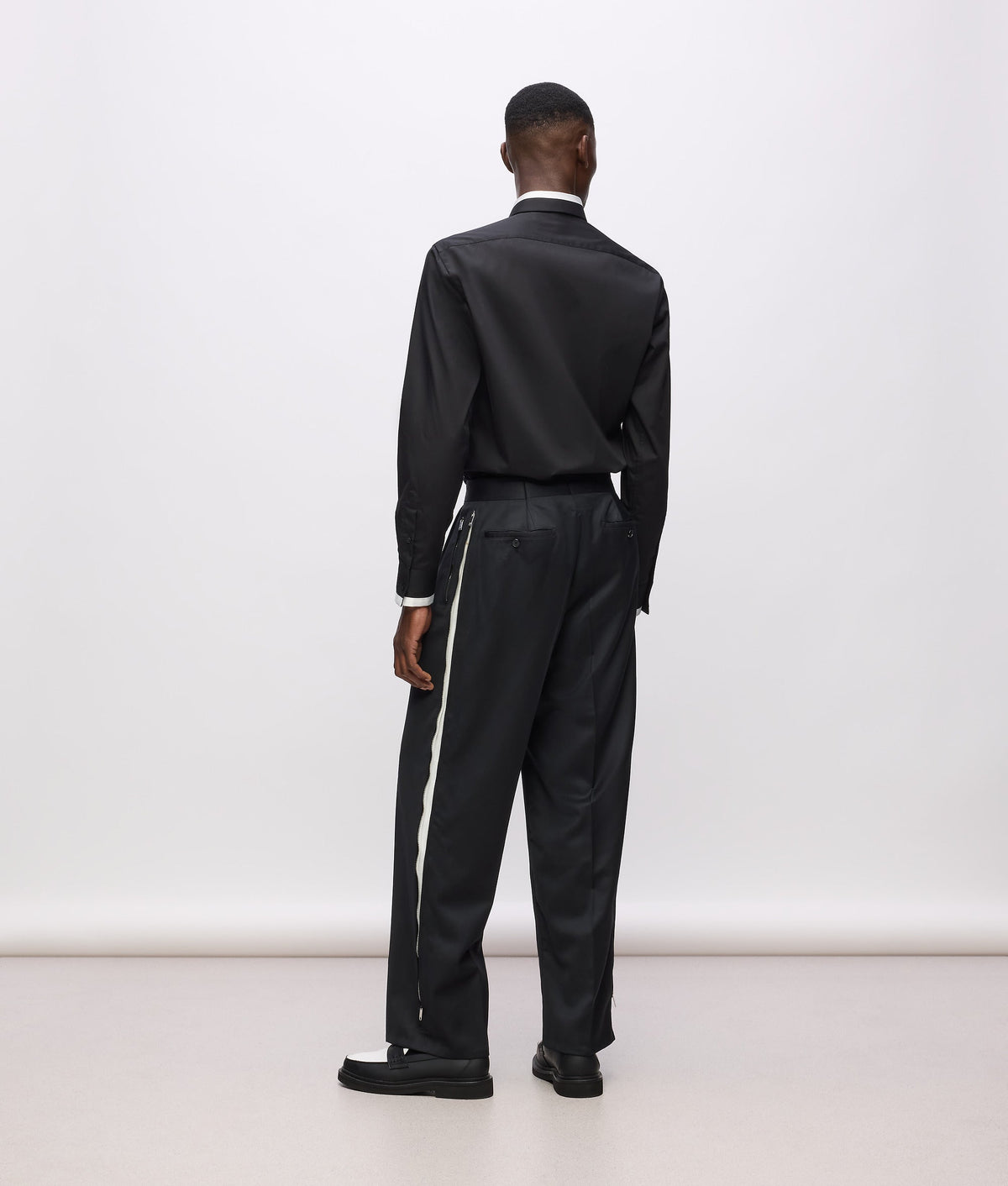 KL Studio contrast piping trousers