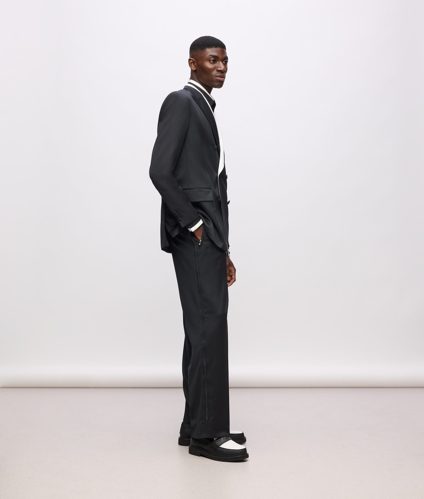 KL Studio contrast piping trousers