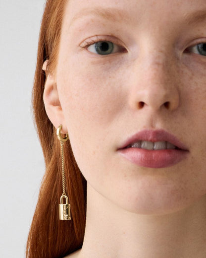 Spade Lock Asymmetrical Linear Earrings