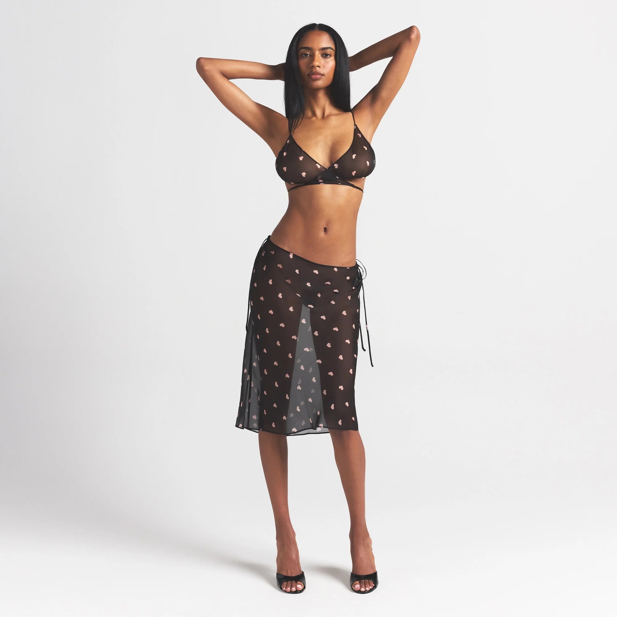 SKIMS ROMANCE TIE SIDE MIDI SKIRT | OBSIDIAN SPACED HEARTS