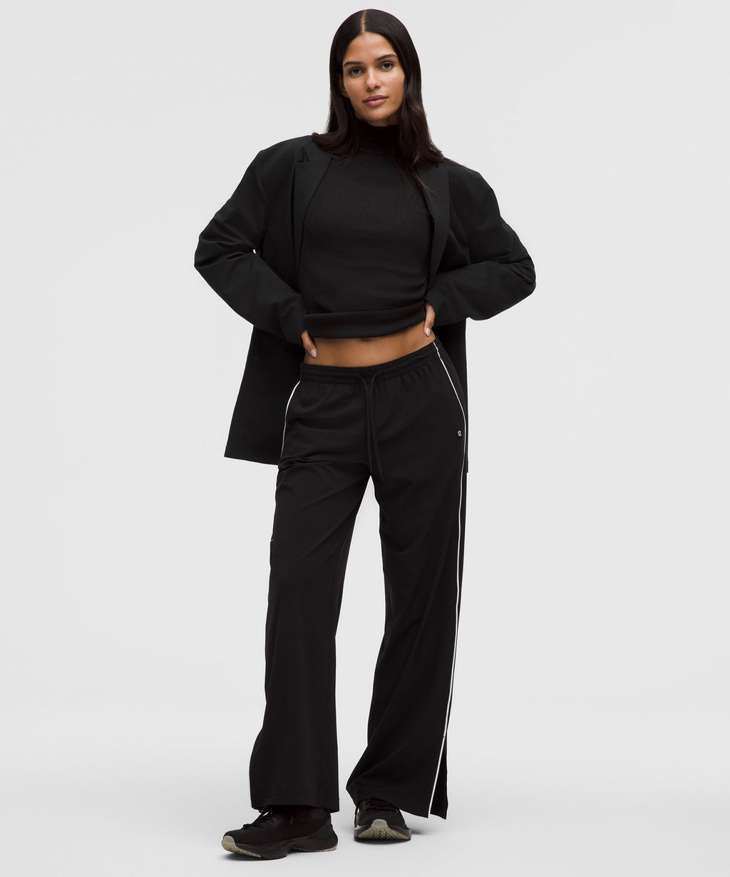 Ribbed Merino-Blend Turtleneck Sweater