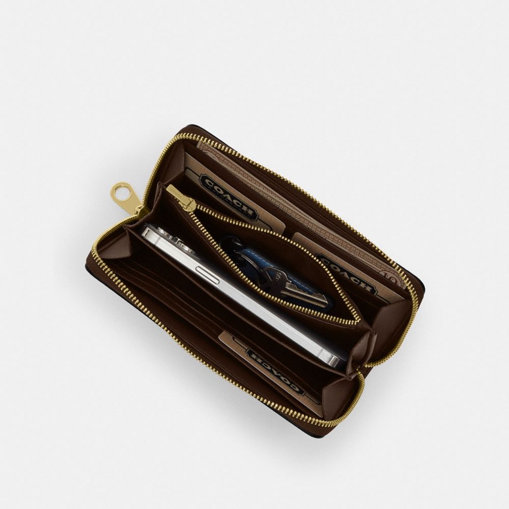 Long Zip Around Wallet In Signature Canvas With Stripe