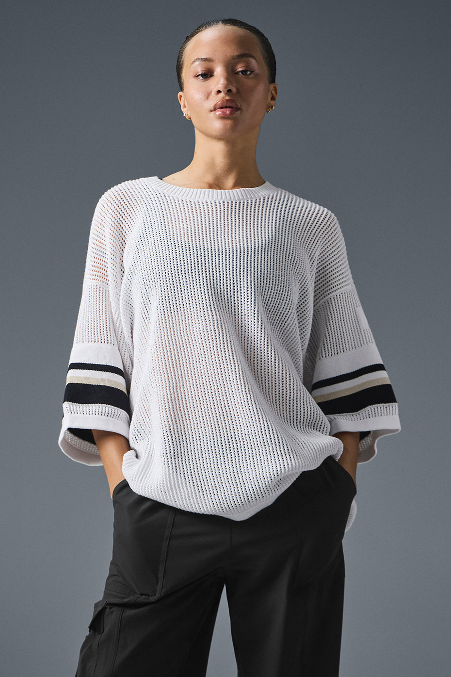 Open knit playoff jersey in white with wide arms, perfect for stylish and versatile day off looks.