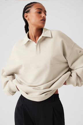 Model wearing Mixmatch Rugby Sweatshirt with sharp collar, dropped shoulders, and oversized fit for a sporty look.