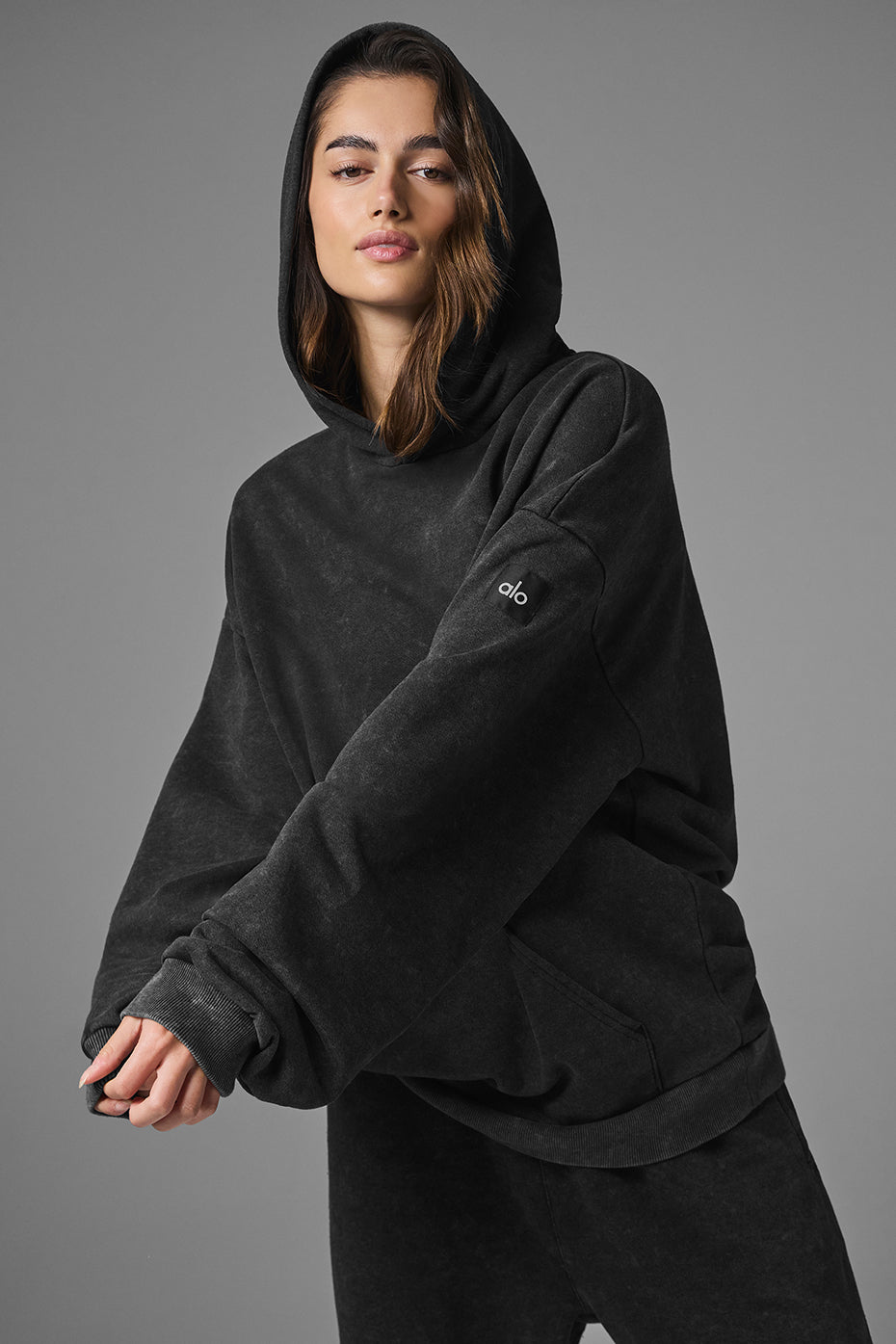 Chill Vintage Wash Hoodie in black, featuring oversized fit, ribbed cuffs, and kangaroo pocket for casual weekend wear.