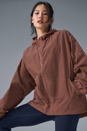 Vantage Nylon Ripstop Track Jacket in brown with structured hood, full-zip front, and cuffed sleeves, ideal for training and cool weather.