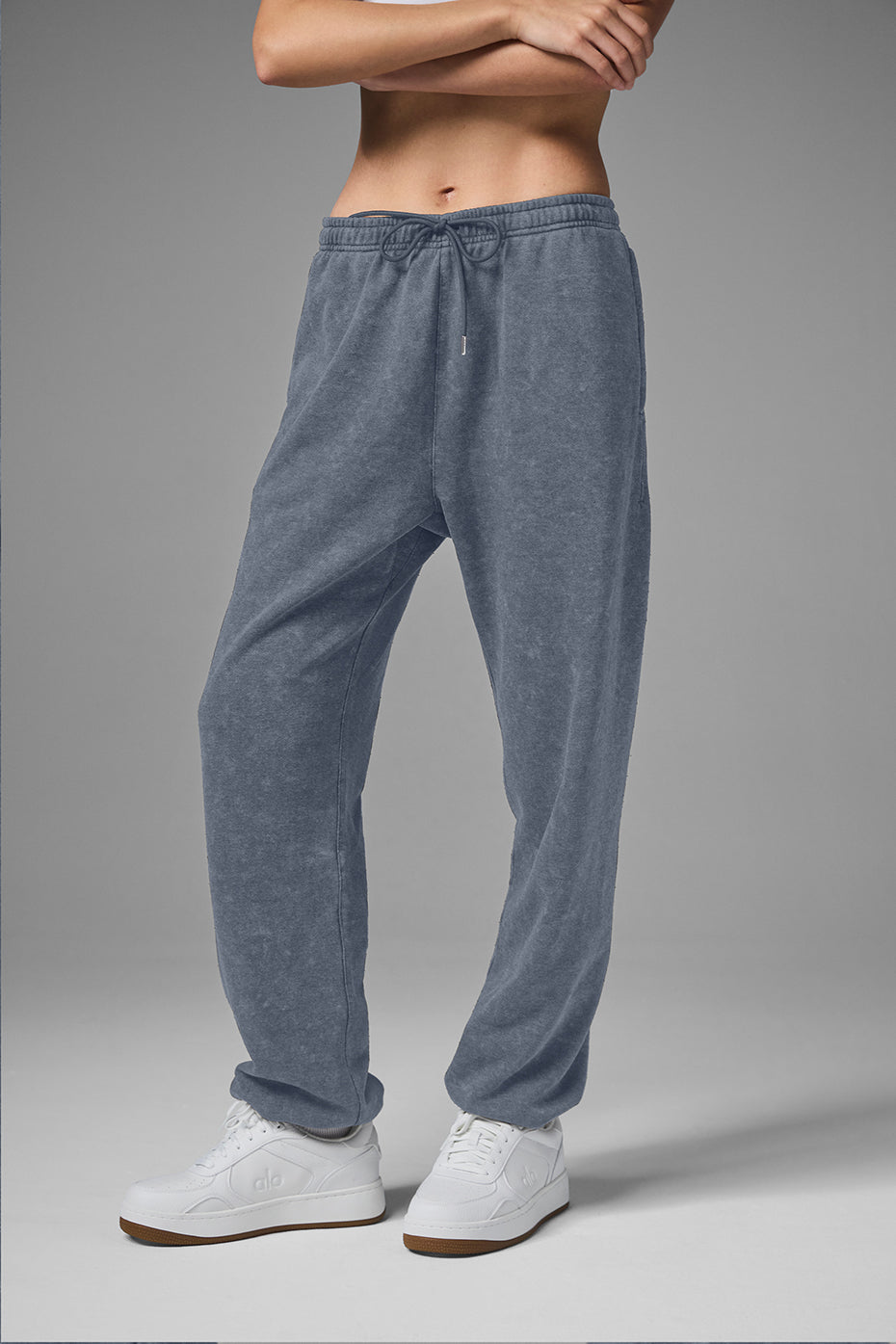 Chill Vintage Wash Sweatpant in faded blue, featuring oversized fit, drawstring waist, and cuffed hems for ultimate comfort.