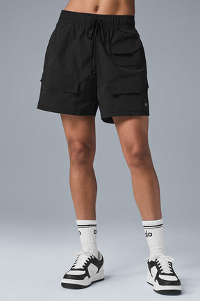 7 inch crinkle nylon cargo shorts with drawstring waist and zippered pockets, perfect for workouts or casual wear.