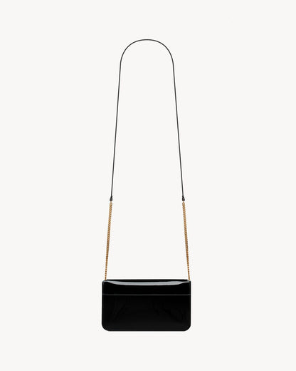 CASSANDRE phone holder IN PATENT LEATHER BLACK