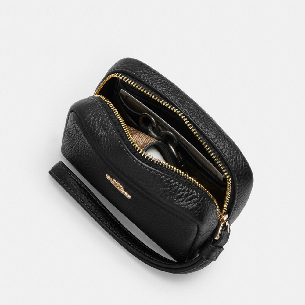 Pouch Wristlet In Signature Canvas