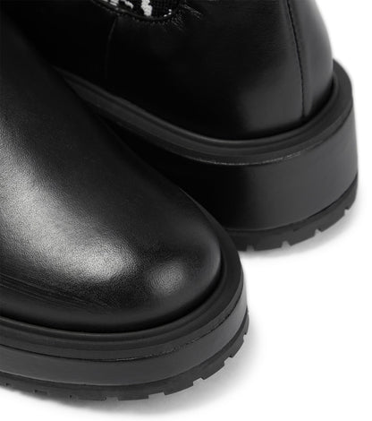 Jacquard knit-trimmed leather boots