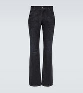Distressed slim jeans