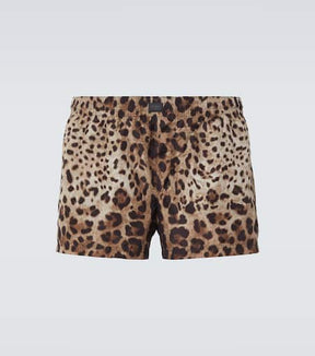 Leopard-print swim trunks