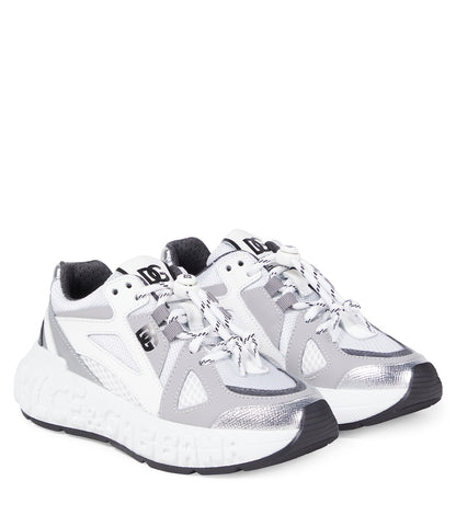 Embossed logo leather-trimmed sneakers