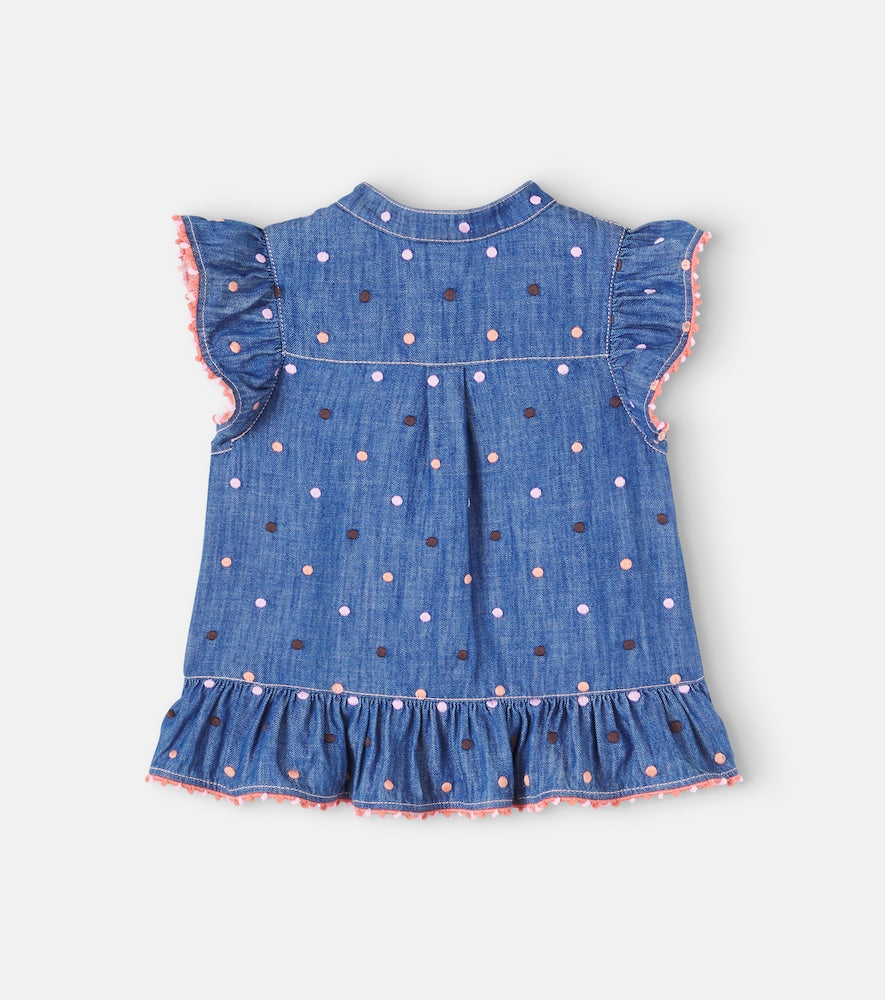 Embroidered polka-dot ruffled denim top
