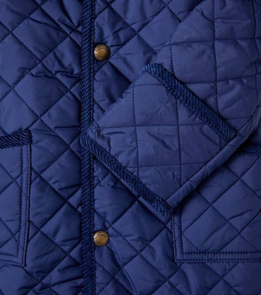 Baby corduroy-trimmed quilted onesie