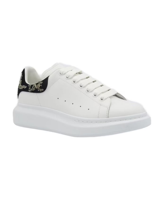 White Sneakers with Graffiti Accents