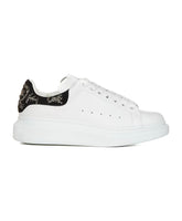 White Sneakers with Graffiti Accents