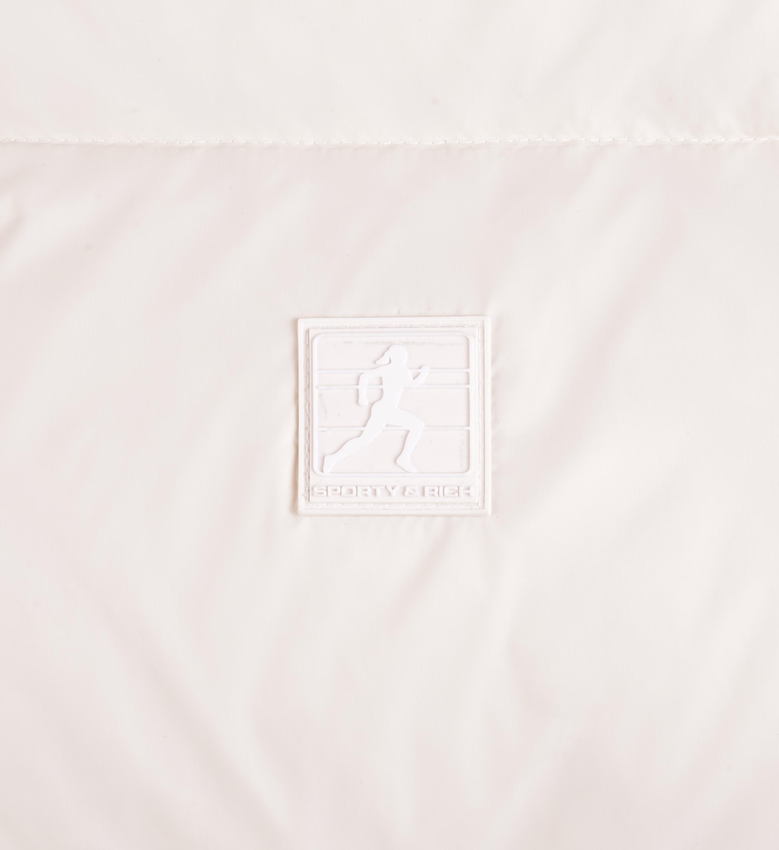 Running Woman Puffer Jacket - Off White