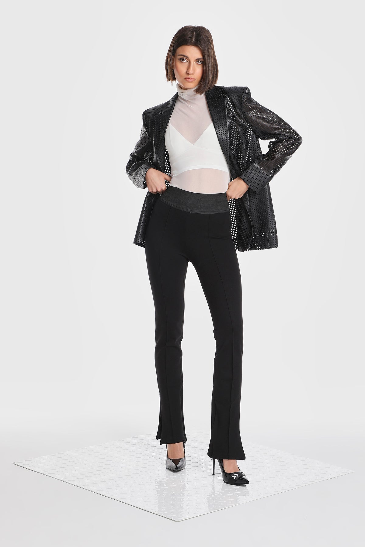 SHEER NET SLEEVELESS TURTLENECK TOP