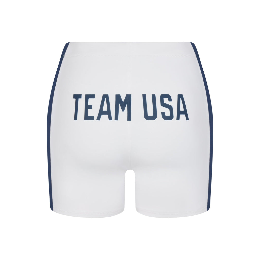 SKIMS FOR TEAM USA SIGNATURE SWIM PARALYMPIC MID WAIST SHORT | WHITE