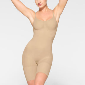 SHEER SEAMLESS MID THIGH BODYSUIT | CLAY