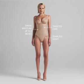 SKIMS BODY CORE SCULPT OPEN BUST THONG BODYSUIT | SAND