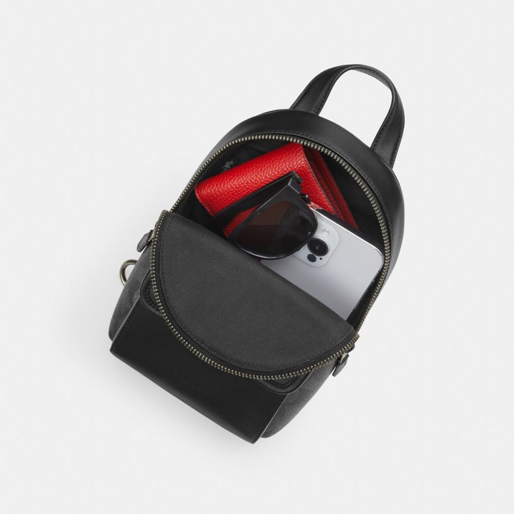 Small Turnlock Sling Pack In Signature Canvas