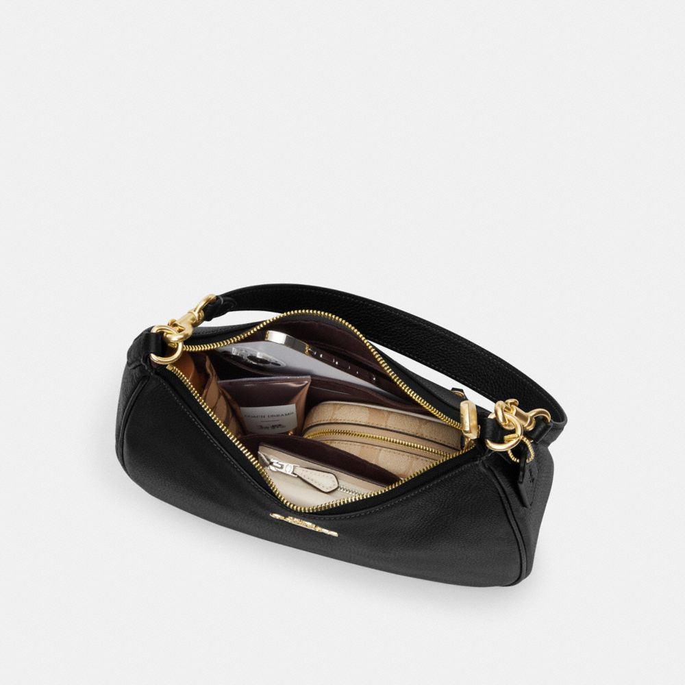 Teri Hobo Bag In Signature Canvas
