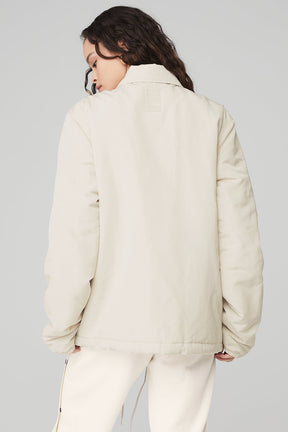 Back view of the Legend Jacket featuring a lightweight design and a classic collar