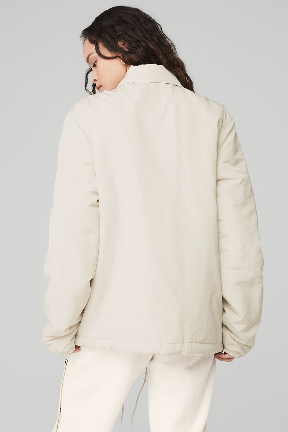 Back view of the Legend Jacket featuring a lightweight design and a classic collar