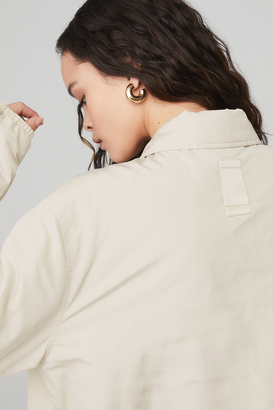 Back view of the Legend Jacket showcasing the iconic collar and back locker loop detail.