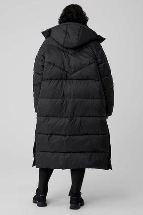 Back view of Gold Rush Puffer Trench showcasing its oversized fit and cozy design for winter weather.
