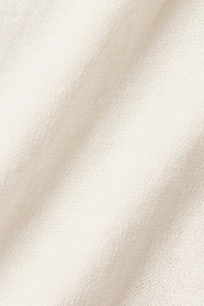 Close-up of lightweight knit fabric in cream color perfect for Supernatural Sweater Henley Tank.