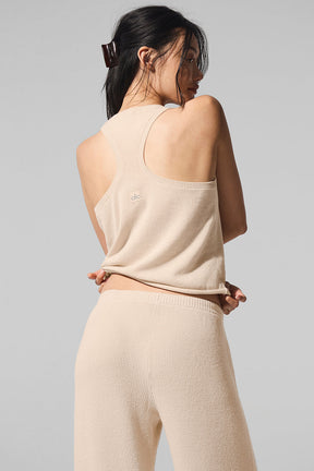 Back view of a model wearing the Supernatural Sweater Henley Tank paired with matching pants, showcasing its lightweight knit design.