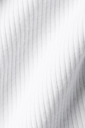 Close-up of silky-soft, stretchy ribbed fabric used for the Ribbed Prosper Tank in white.