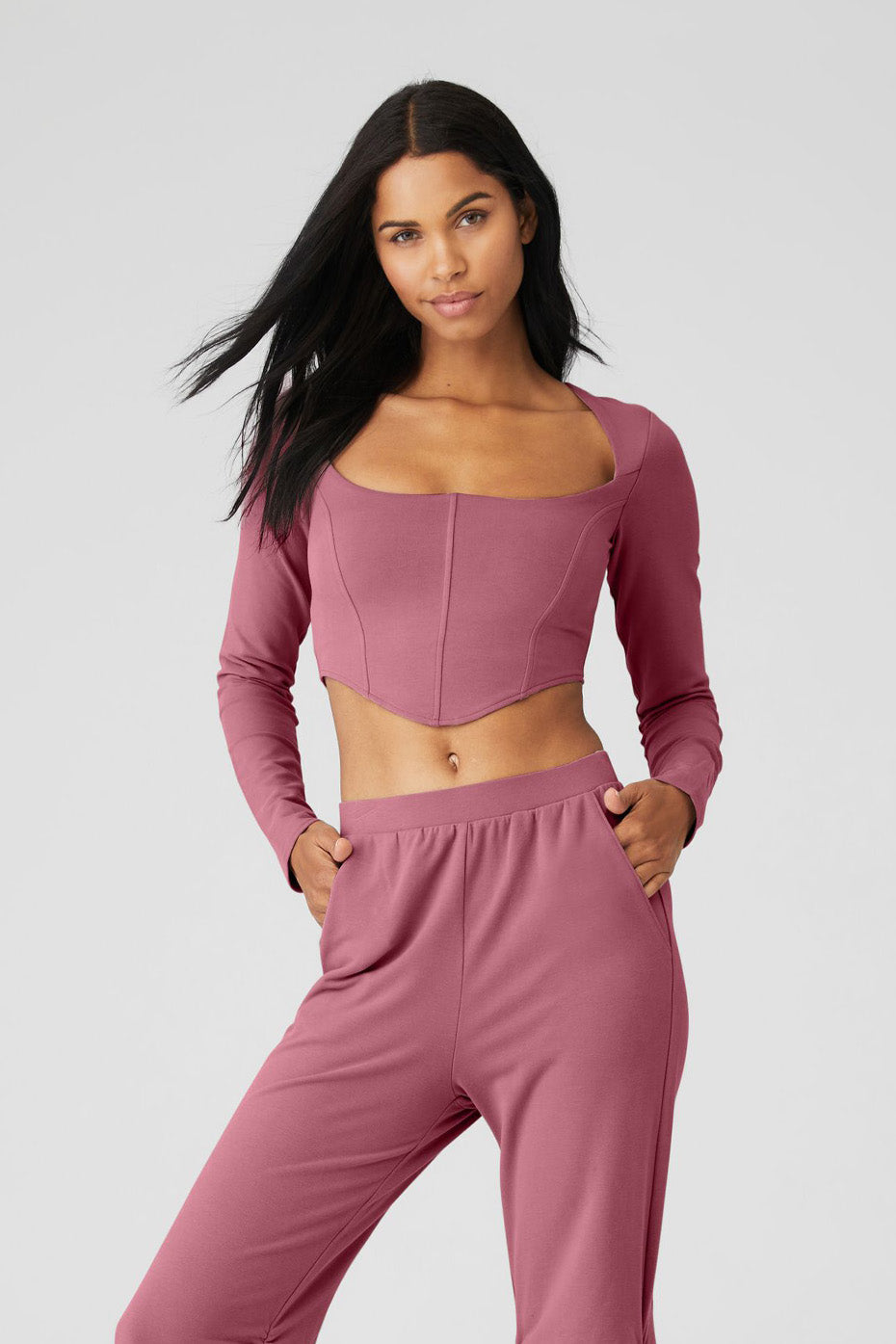ALO Softsculpt Long Sleeve crop top in soft micro French terry with corset panels and sweetheart neckline.