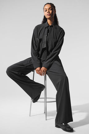 Model wearing the Dreamscape Button Down Long Sleeve with High-Waist Dreamscape Trouser in a stylish, oversized fit.