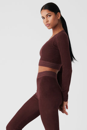 Model wearing Seamless Luxe Terry Cuddle Coverup in warm burgundy, showcasing soft fabric and relaxed fit.