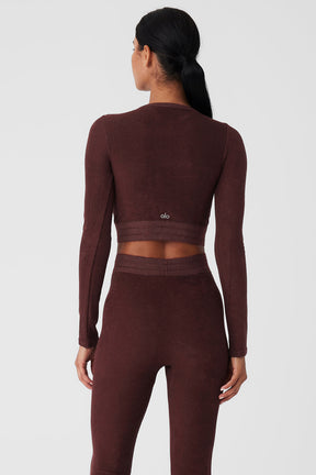 Women wearing Seamless Luxe Terry Cuddle Coverup, showcasing the back view and stretchy, warm fabric.
