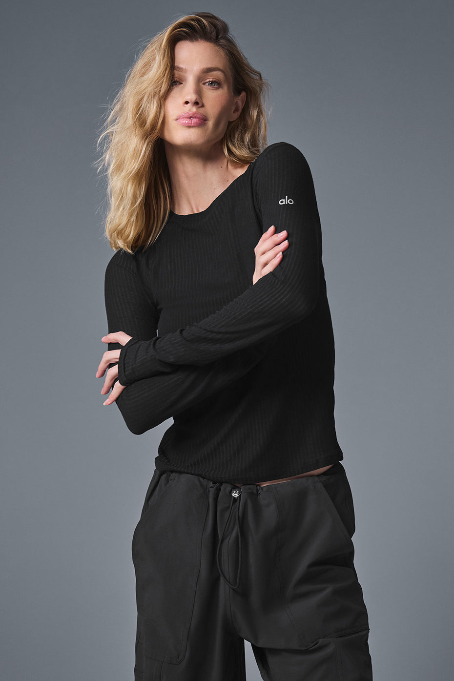 Ribbed Sea Coast long sleeve shirt in black, showcasing a soft and stretchy fabric with ribbing for versatile styling.