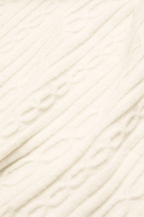 Close-up of the soft, chunky cable knit pattern on the Cable Knit Winter Bliss Hoodie in cream color.