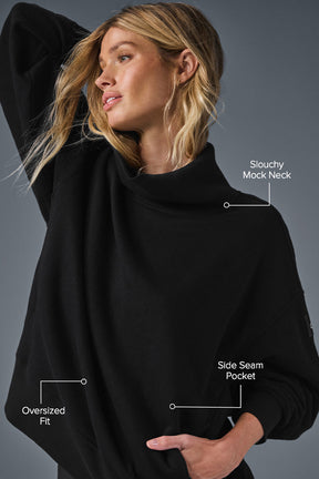 Hazy Mock Neck Pullover showcasing slouchy mock neck, oversized fit, and side seam pocket in black color.