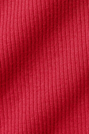 Close-up of ribbed fabric in vibrant red, showcasing texture and depth for Ribbed Mesmerize Long Sleeve.