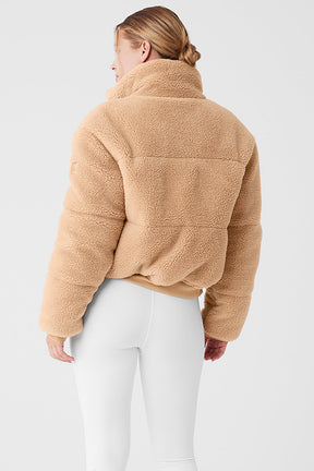 Cozy Sherpa Snow Angel Puffer jacket featuring a tall collar and plush material, perfect for winter warmth.