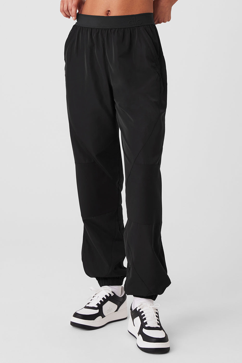 Mixed Media Reinvention Jogger in black featuring relaxed fit, stretchy waistband, and contrasting panels, perfect for sporty looks.