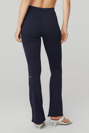 High-waist pinstripe flare legging with invisible zippers, made from breathable interlock fabric for a flattering fit.