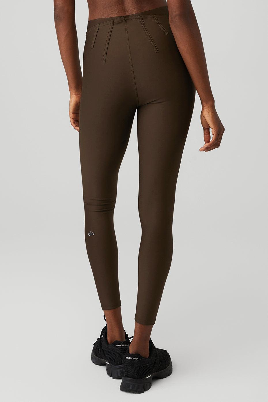 Back view of Airlift High-Waist 7/8 Corset Legging in dark brown, featuring sculpting and contouring design.